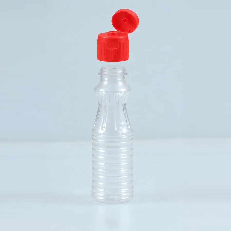 Clear 125 ml PET bottle with ribbed body and red flip-top cap open, Trio Pack Series by Majid Industries