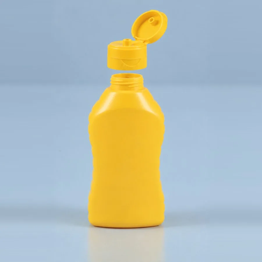 Yellow Mustard Sauce plastic squeeze bottle 275 g with flip-top cap open, by Majid Industries