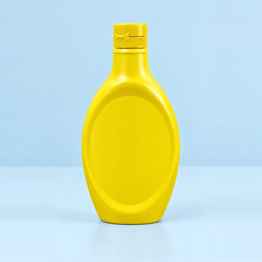 Yellow plastic topping sauce squeeze bottle with screw cap, by Majid Industries